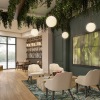 interior with green walls and plants on ceiling