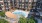 a swimming pool in a courtyard between buildings