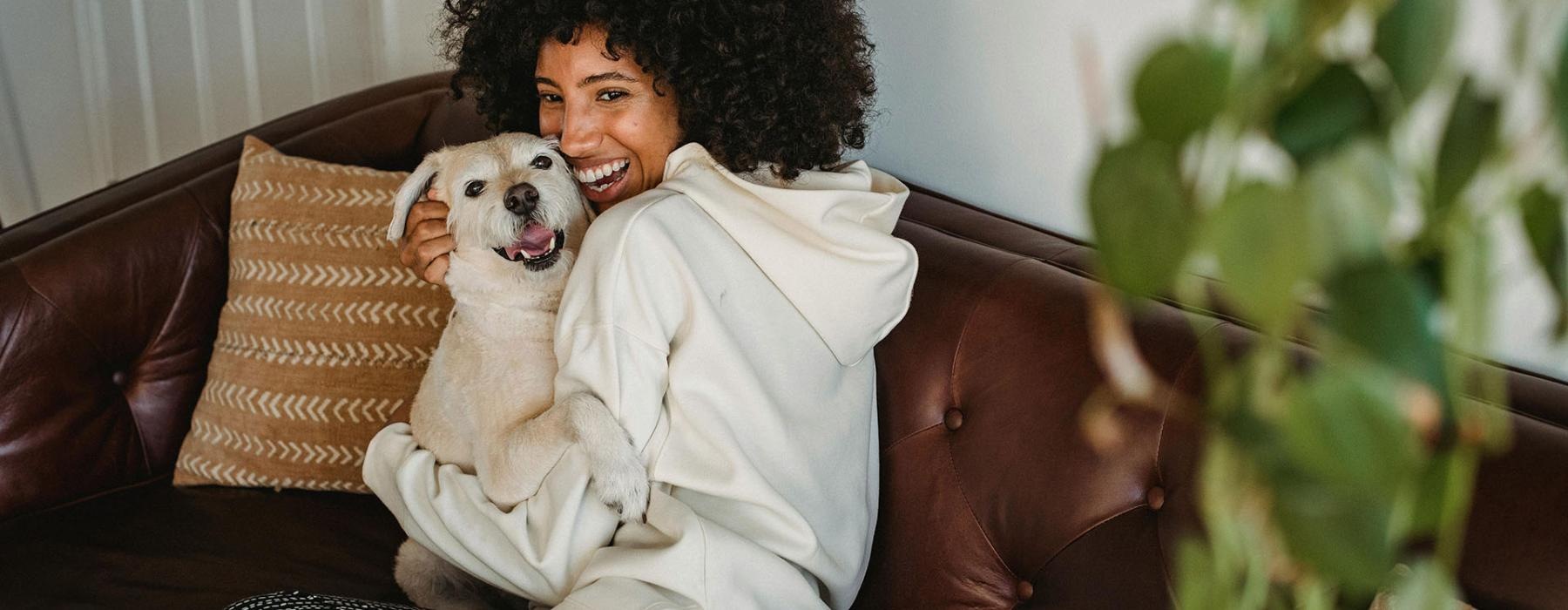 a person holding a dog