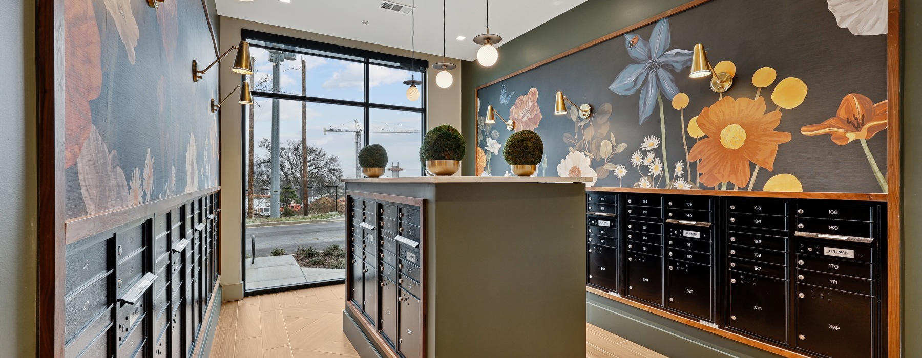 large mailroom with floral walls