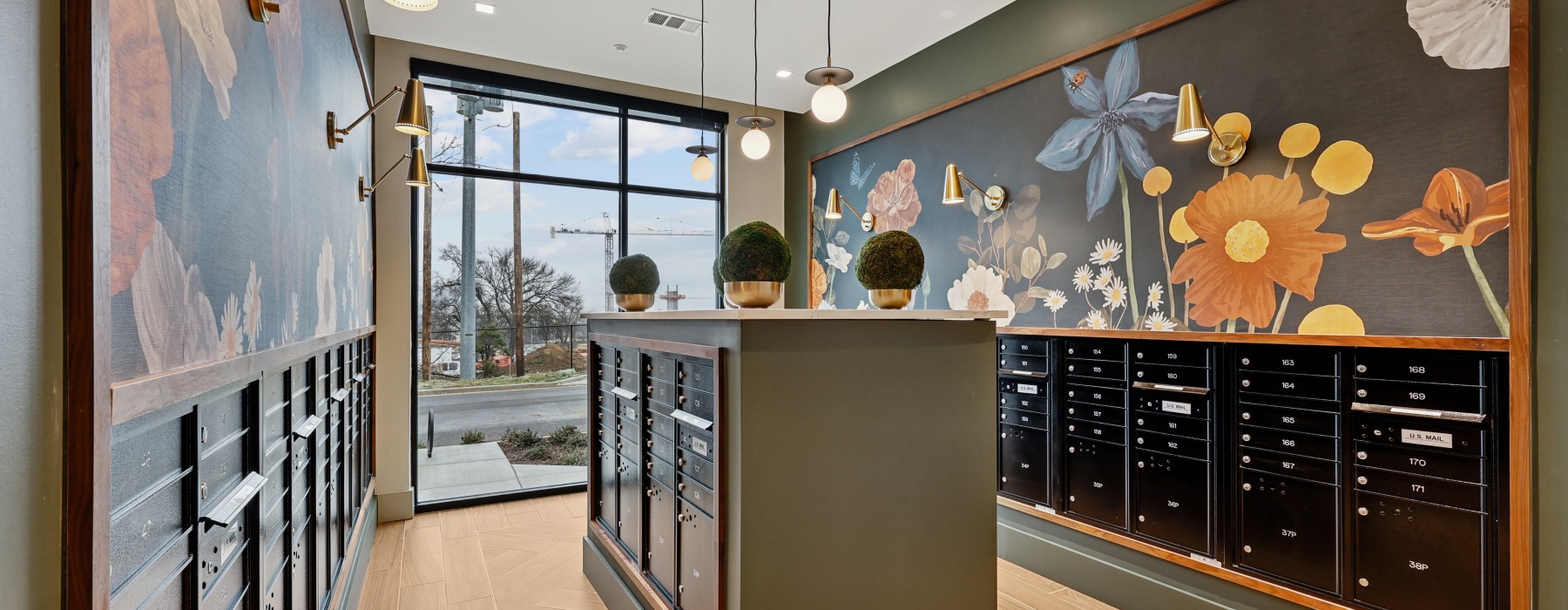 large mailroom with floral walls